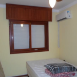 LOTE 001 - Apartamento n° 402 com a área real privativa de 75,78m² + Box n° 07 com a área real privativa de 14,16m², localizados no Edifício Athenas, sito à Rua Guaraci, n° 1521, Zona Nova de Capão da Canoa/RS